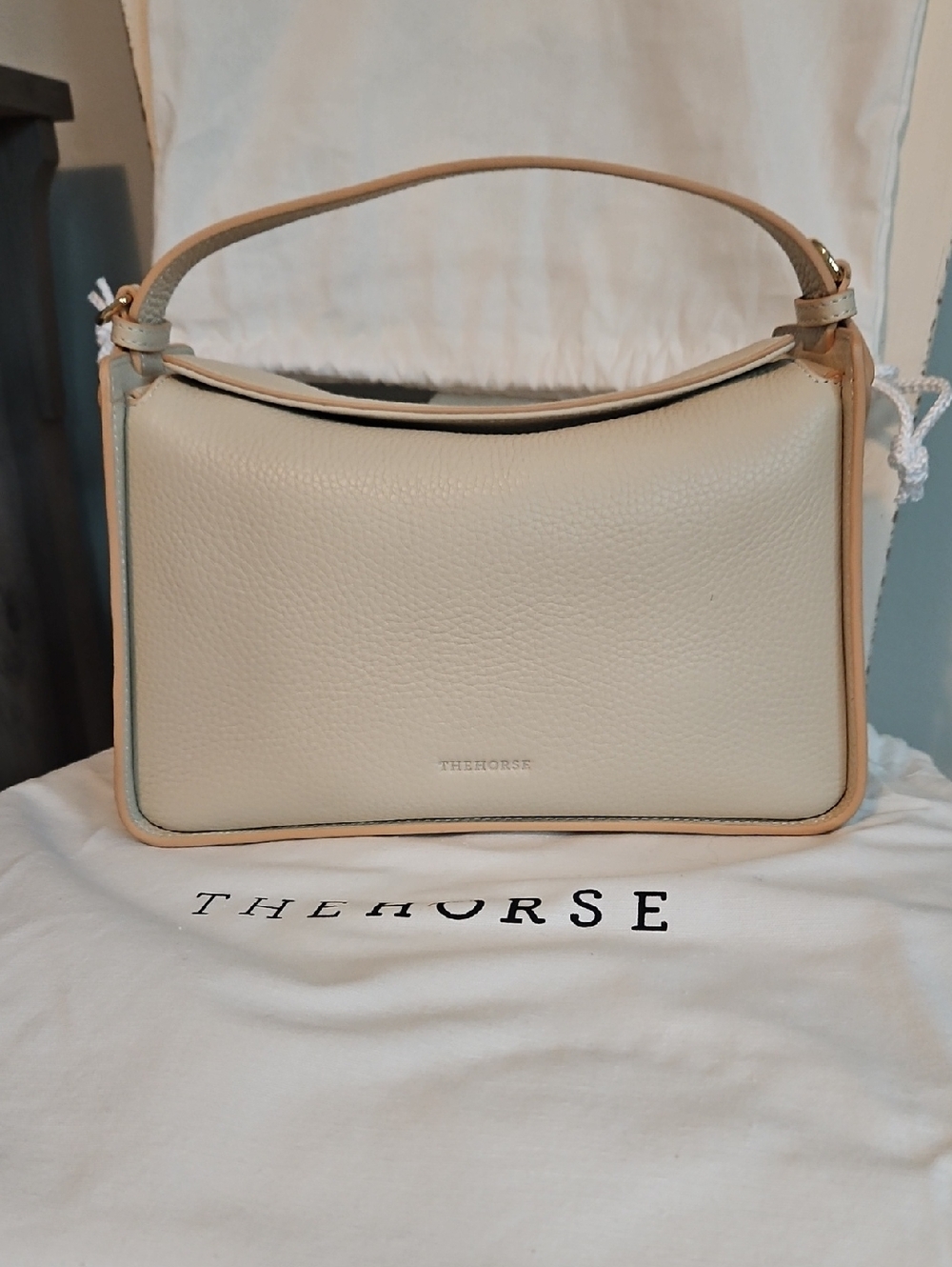 The Horse Cream Pebbled Leather Top-Handle Shoulder Bag with Tan Trim